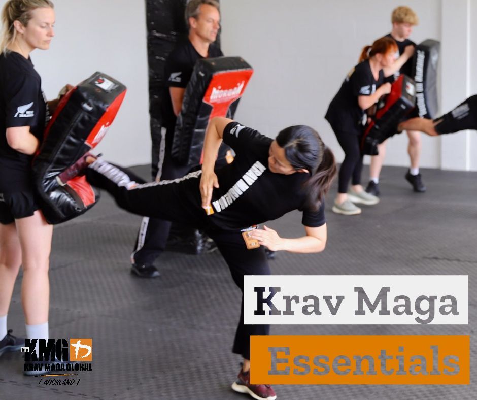 Krav Maga Essentials course group training class practising side kicks in Auckland