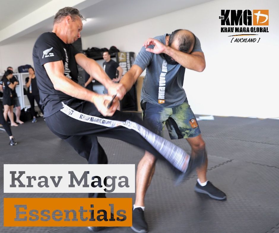 Krav Maga Essentials course practising defence against a knife threat in a controlled training drill in Auckland