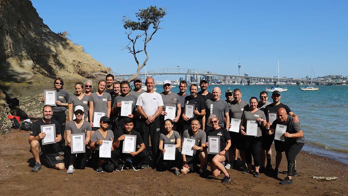 KMG New Zealand students receiving diplomas after completing a course taught by Eyal Yanilov in Auckland