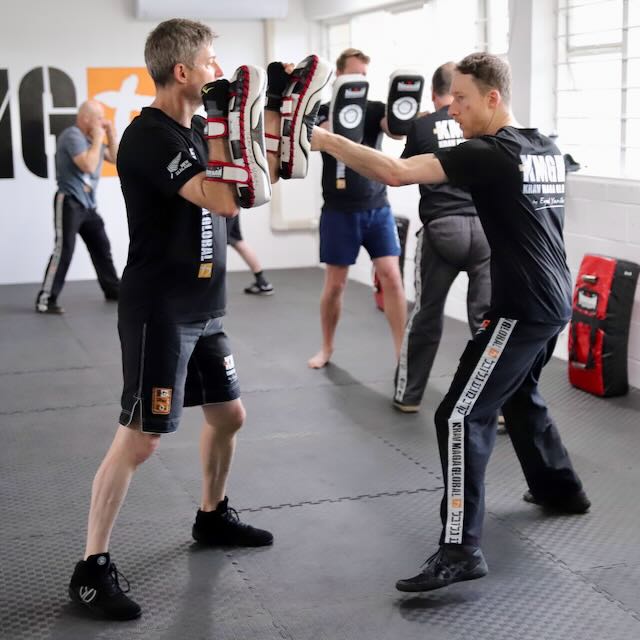 A Krav Maga Auckland student drilling a straight punch during class on the North Shore