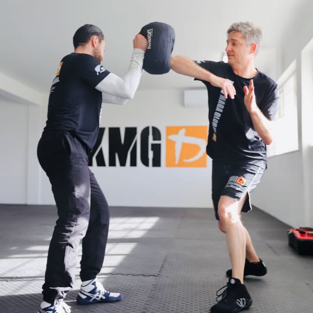 Instructor Aaron training elbow striking with a student at Krav Maga Auckland, Birkenhead