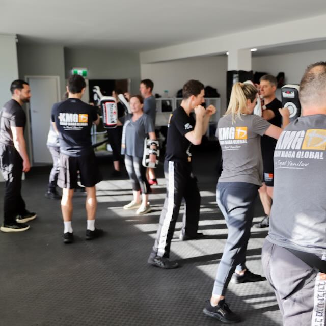 KMG New Zealand class working on structured drills — building foundation skills in a progressive training programme