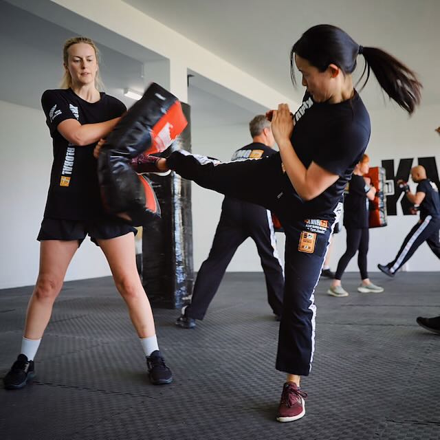 Krav Maga student training a round kick at Krav Maga Auckland, North Shore Birkenhead