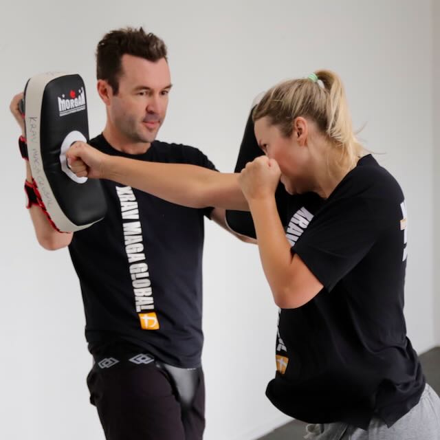 Woman training a punch in a Krav Maga class at Krav Maga Auckland, Birkenhead