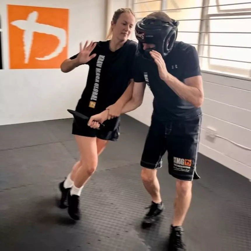 Krav Maga knife defence safety training with rubber knife and protective gear at KMG New Zealand