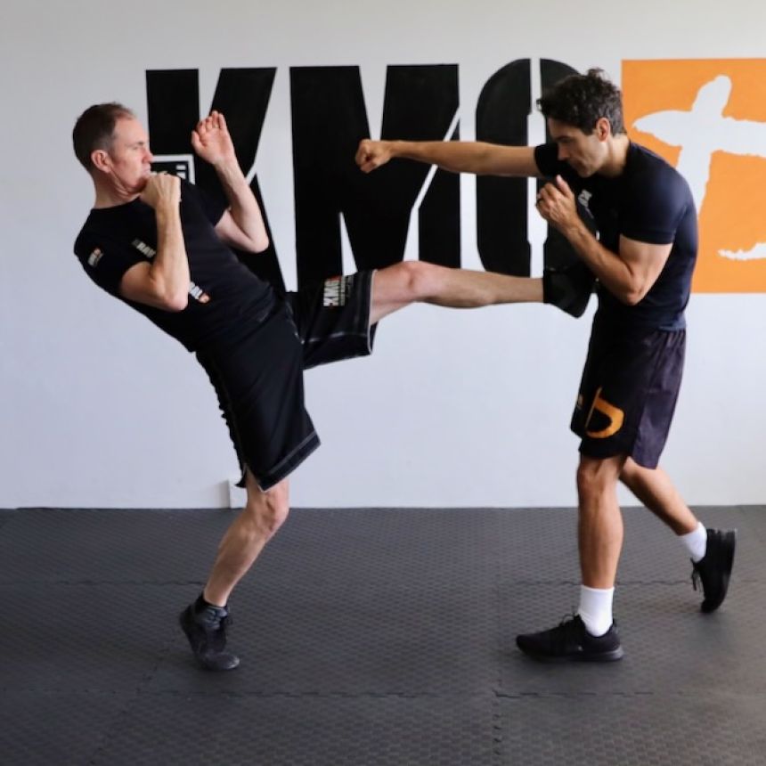KMG instructor demonstrating a Krav Maga defence technique during training in New Zealand