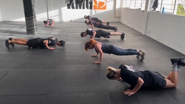 Group conditioning work during a Krav Maga class at Krav Maga Auckland, North Shore Birkenhead